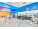 Bright gym featuring free weights, weight machines, and fitness center with reception desk and mirrored wall at 2608 Leisure World --, Mesa, AZ 85206