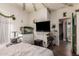 This bedroom with wood floors is accented with creative decor and includes a view into an adjacent room at 2635 E Chester Dr, Chandler, AZ 85286