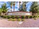 The Rancho Del Ray community sign surrounded by lush landscaping under a sunny sky at 2635 E Chester Dr, Chandler, AZ 85286