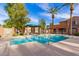 Community pool offers a refreshing escape with covered seating area nearby at 2635 E Chester Dr, Chandler, AZ 85286