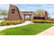 Stone community entrance to Adora Trails featuring landscaped grounds and decorative signage on a sunny day at 2748 E Cherry Hill Dr, Gilbert, AZ 85298