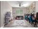 Spacious playroom featuring neutral tones, a large window, carpet flooring, and ample space for play and learning at 2748 E Cherry Hill Dr, Gilbert, AZ 85298