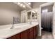 Spacious bathroom with double sink vanity and large mirror at 2811 W Glenhaven Dr, Phoenix, AZ 85045