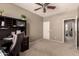 Neutral office space with ceiling fan and natural light from the doorway at 2811 W Glenhaven Dr, Phoenix, AZ 85045