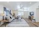 Open-concept living room featuring modern furnishings, wood floors, and lots of natural light at 2925 E North Ln, Phoenix, AZ 85028