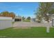 Expansive backyard featuring a detached garage, shed, and secure fencing at 3333 N 81St Ave, Phoenix, AZ 85033