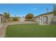 Exterior shot of the property showing garage and yard at 3333 N 81St Ave, Phoenix, AZ 85033