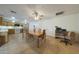 Kitchen area featuring stainless steel appliances and a dining area at 3333 N 81St Ave, Phoenix, AZ 85033