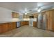 Well-equipped kitchen featuring stainless steel appliances and ample counter space at 3333 N 81St Ave, Phoenix, AZ 85033