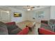 Cozy living room with neutral walls, tiled floor, and comfortable seating at 3333 N 81St Ave, Phoenix, AZ 85033