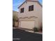 Two-story home featuring a spacious two car attached garage, and well-manicured front yard at 3518 S Posse Trl, Gilbert, AZ 85297