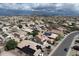 Bird's eye view of a residential area with houses equipped with solar panels, showcasing the community at 3614 W Alyssa Ln, Phoenix, AZ 85083