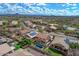 Expansive aerial view of the community highlighting a home with solar panels, pool, and landscaping at 3614 W Alyssa Ln, Phoenix, AZ 85083