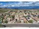 A wide shot of a neighborhood featuring homes with solar panels and a view of the mountains at 3614 W Alyssa Ln, Phoenix, AZ 85083