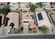 Overhead shot of a property with solar panels, a private pool, and well-maintained landscaping at 3614 W Alyssa Ln, Phoenix, AZ 85083