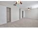 Large bonus room with ceiling fan, closet, and plenty of space at 3614 W Alyssa Ln, Phoenix, AZ 85083