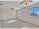 Open bonus room with carpet, ceiling fans, and natural light at 3614 W Alyssa Ln, Phoenix, AZ 85083