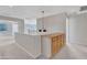 Bright second floor hallway featuring a built-in cabinet and modern light fixture at 3614 W Alyssa Ln, Phoenix, AZ 85083