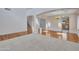 Open living room area features hardwood floors, a staircase, and view into the kitchen at 3614 W Alyssa Ln, Phoenix, AZ 85083