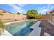 Sparkling pool and easy-care landscaping define this private and inviting backyard at 3614 W Alyssa Ln, Phoenix, AZ 85083