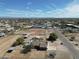 Expansive horse property showcased from above, featuring arenas, shelters, and residential surroundings at 3720 E Vista Grande --, San Tan Valley, AZ 85140