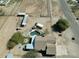 Aerial view of home with pool, outdoor kitchen, fire pit, horse facilities, and ample space at 3720 E Vista Grande --, San Tan Valley, AZ 85140