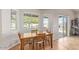 Bright dining area with wood table, natural light, and neutral walls at 3720 E Vista Grande --, San Tan Valley, AZ 85140