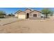 Inviting single-story home featuring a two-car garage, complemented by desert landscaping at 3720 E Vista Grande --, San Tan Valley, AZ 85140