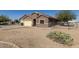 Single-story home with desert landscaping, a two-car garage, and fenced yard space at 3720 E Vista Grande --, San Tan Valley, AZ 85140