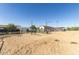 Outdoor horse-keeping facilities featuring metal fencing and shelters, perfect for animal care and equestrian activities at 3720 E Vista Grande --, San Tan Valley, AZ 85140