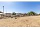 Outdoor horse facilities with metal fencing and open shelters, providing ample space for livestock and animal care at 3720 E Vista Grande --, San Tan Valley, AZ 85140