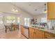 Open kitchen featuring granite countertops, stainless steel appliances, and breakfast nook at 3720 E Vista Grande --, San Tan Valley, AZ 85140