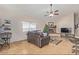 Cozy living room featuring a fireplace, comfortable seating, and ample natural light at 3720 E Vista Grande --, San Tan Valley, AZ 85140