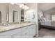 Main bathroom with dual sinks, granite counters, and generous counter space at 3720 E Vista Grande --, San Tan Valley, AZ 85140