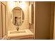 Bathroom featuring vanity with marble countertop and decorative mirror at 4365 E Milton Dr, Cave Creek, AZ 85331