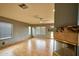 Open living room featuring a tile floor, fireplace, and large windows at 4365 E Milton Dr, Cave Creek, AZ 85331