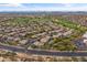 A beautiful aerial view features a desert neighborhood with a nearby golf course at 4607 E Rancho Laredo Dr, Cave Creek, AZ 85331