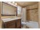 A bathroom with a shower and tub combination and a dark wooden vanity at 4607 E Rancho Laredo Dr, Cave Creek, AZ 85331