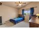 Comfortable bedroom featuring neutral walls, carpet, and a window with natural light at 4607 E Rancho Laredo Dr, Cave Creek, AZ 85331