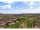 Scenic aerial shot of the golf course highlighting lush green fairways, desert landscaping, and community homes at 4607 E Rancho Laredo Dr, Cave Creek, AZ 85331