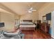 Bright main bedroom with hardwood flooring, ceiling fan, and large windows at 4607 E Rancho Laredo Dr, Cave Creek, AZ 85331