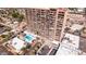 Aerial view of high rise building with pool and easy access to parking and surrounding neighborhoods at 4750 N Central Ave # 12H, Phoenix, AZ 85012