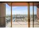 City skyline view from this balcony with orange trim and steel railing in an urban setting at 4750 N Central Ave # 12H, Phoenix, AZ 85012