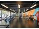 Bright fitness center with cardio machines, weights, and floor-to-ceiling mirrors for complete workouts at 4750 N Central Ave # 12H, Phoenix, AZ 85012