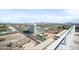 Rooftop patio view of the city and mountains on a clear and sunny day at 4750 N Central Ave # 12H, Phoenix, AZ 85012