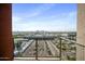 Enjoy a beautiful city view from this balcony with metal railing and desert landscape beyond at 4750 N Central Ave # 12H, Phoenix, AZ 85012