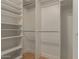 Walk-in closet featuring custom shelving and ample storage space at 5513 N 5Th Dr, Phoenix, AZ 85013