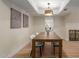 Elegant dining room featuring a long wooden table and stylish decor at 5513 N 5Th Dr, Phoenix, AZ 85013