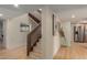 Inviting entryway with stairs and view of a modern kitchen at 5513 N 5Th Dr, Phoenix, AZ 85013