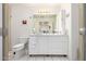 Bright bathroom featuring modern vanity, vessel sink, and ample lighting at 5771 W Gail Dr, Chandler, AZ 85226